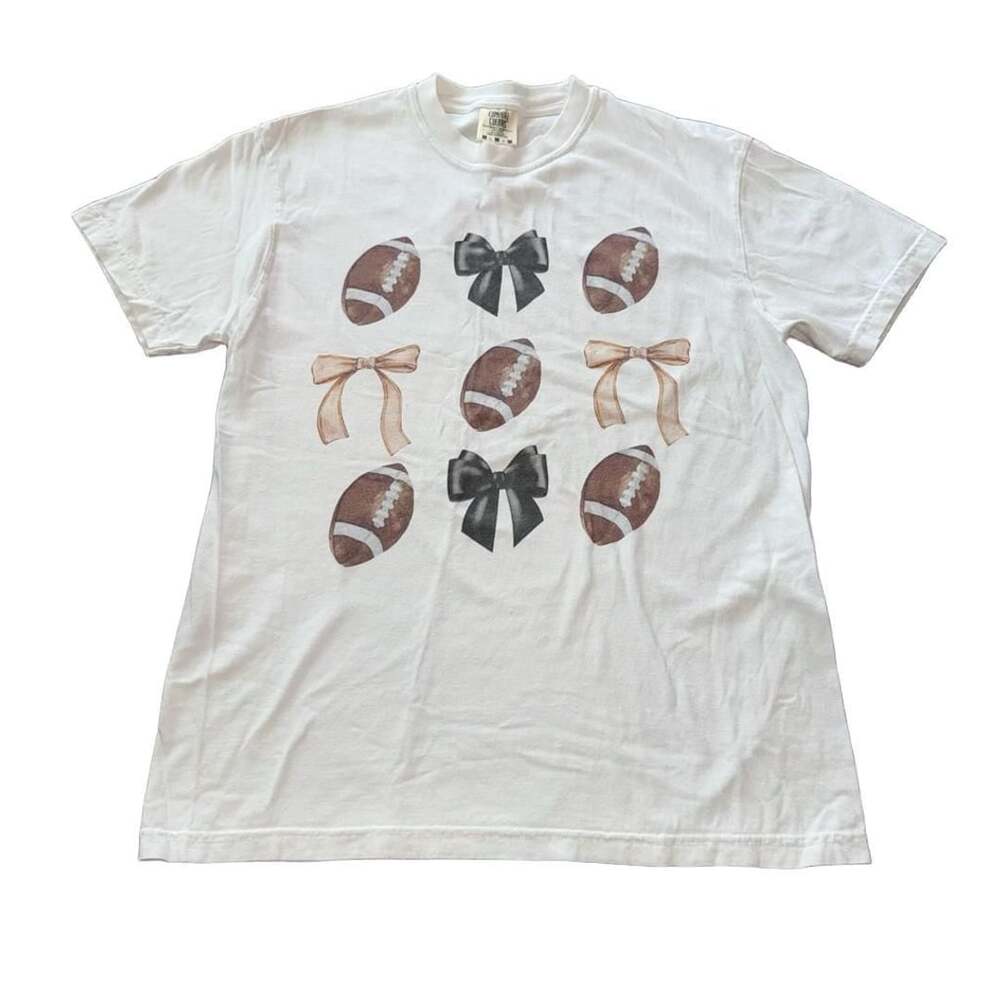 Comfort Colors Women’s Bows and Football Short Sleeve Relaxed Fit T-Shirt Medium